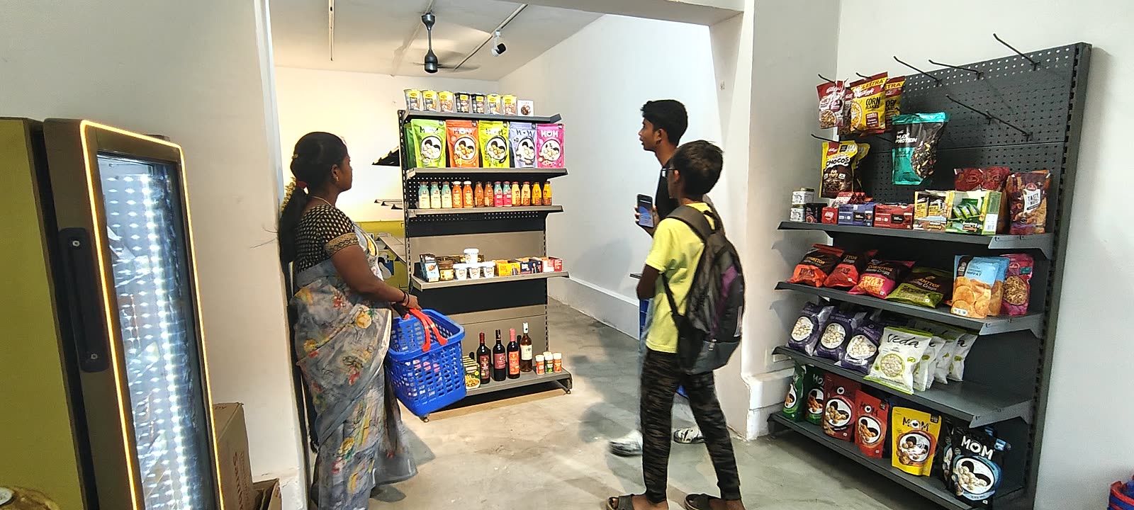 Customers at the racks of the IRL Space shop in NRT Nagar, Theni